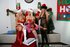 Three whores in cute Christmas attire have a fun time fucking Santa together.