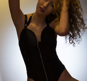 Luscious blonde in black nighty teases with her alluring body before she