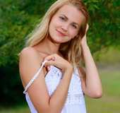 Green eyed blonde teasing outdoors and taking off white dress to expose