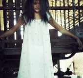 Pierced belly brunette with big juggs taking off white dress and undies