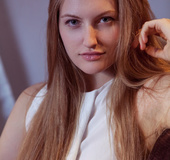 Long haired stunner with pierced belly and shaved cunt sheds red pants