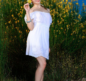 Blue eyed brunette with natural breast exposing her shaved coochie while