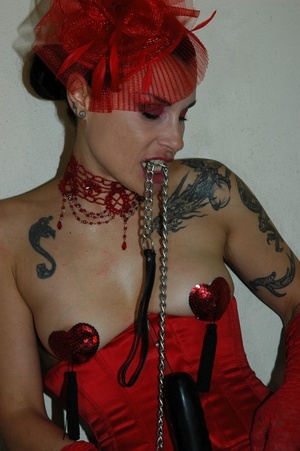 Tattooed brunette in red corset and stoc - XXX Dessert - Picture 1