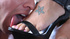 Her eyes look deeply into his face while his cock spurts coating her face