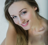 Cute babe pose topless and teases with her juicy boobs and indulging pussy