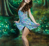 Sweet babe teases with her smoking hot body in multi colored floral dress