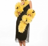 Foxy blonde takes off her black dress and expose her luscious boobs and