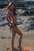 Hot babe teases with her smoking hot body wearing her black bikini in