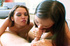 Hot brunette babe and her asian friend take turns sucking cock