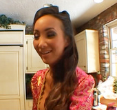 Hot asian babe shown in behind the scenes video for her shoot