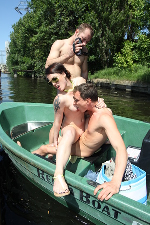 Slut with dark hair and nice boobs gets fucked by two men in a boat - XXXonXXX - Pic 8