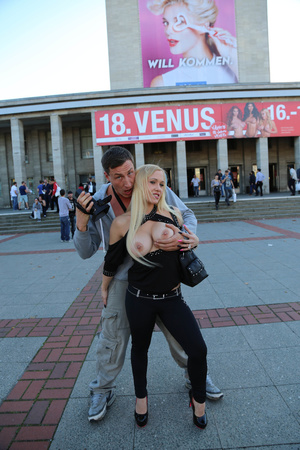 Blonde stunner poses seductively and shows her massive tits in public - XXXonXXX - Pic 14