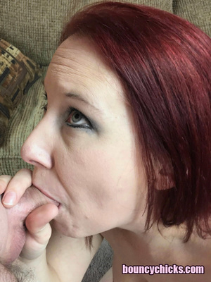 Grey-eyed redhead dressed in black deepthroating a tiny cock - Picture 10