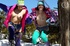 Lesbian chicks wearing multi colored ski caps, jackets, jeans shorts,