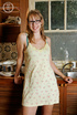Nerdy chick with glasses peels off her yellow dress and displays her skinny