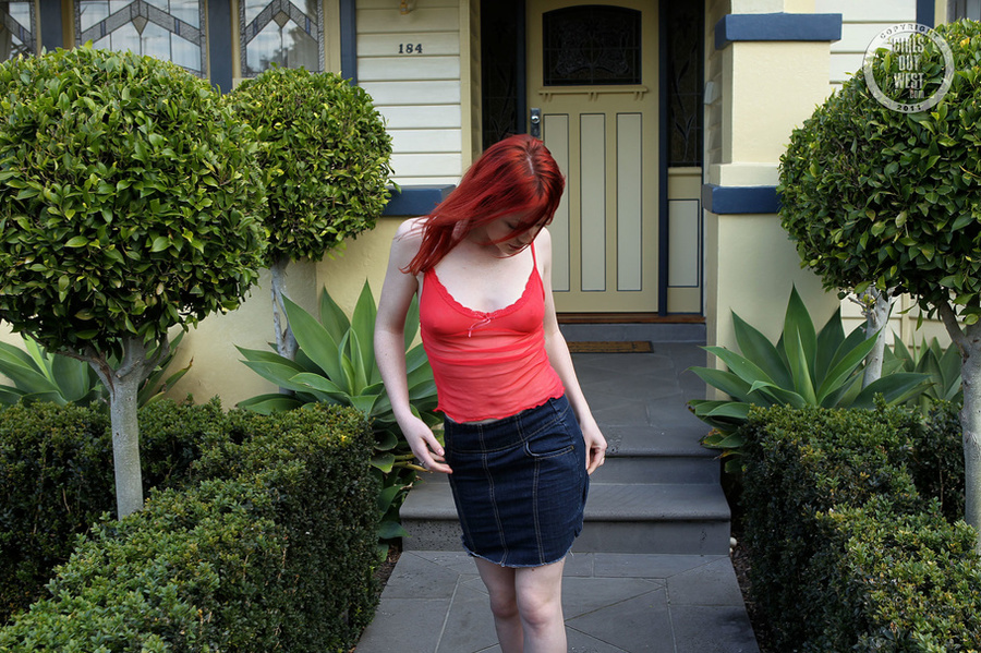Steaming hot redhead displays her foxy body in red lingerie and jeans skirt before she peels off her nighty and bares her petite boobs then strips down her panty and expose her lusty ass in different poses outside her ass. - XXXonXXX - Pic 15