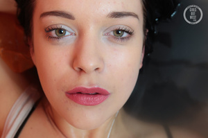 Indulging babe gets her luscious body wet as she takes a bubble bath before she peels off her white shirt then shows her juicy boobs wearing her black bra and white panty. - XXXonXXX - Pic 12