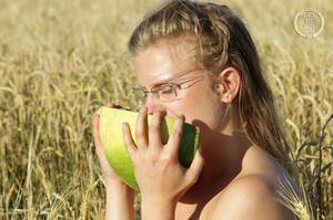 Blonde babe with glasses teases with her foxy body while she eats her watermelon in a crop field before she stips off her white dress and shows her lusty pussy and sweet crack in different poses in a crop field. - XXXonXXX - Pic 2