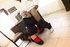 Blonde milf in black stockings wiggles out of black suit to blow dick