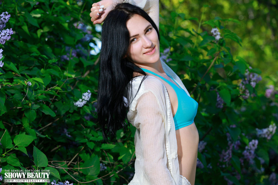 Alluring babe teases with her luscious body in white blouse, blue bra and white shorts in a garden before she gets naked and shows her lusty boobs and sweet pussy in different poses. - XXXonXXX - Pic 1