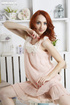 alluring redhead displays her