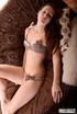 cute redhead displays her