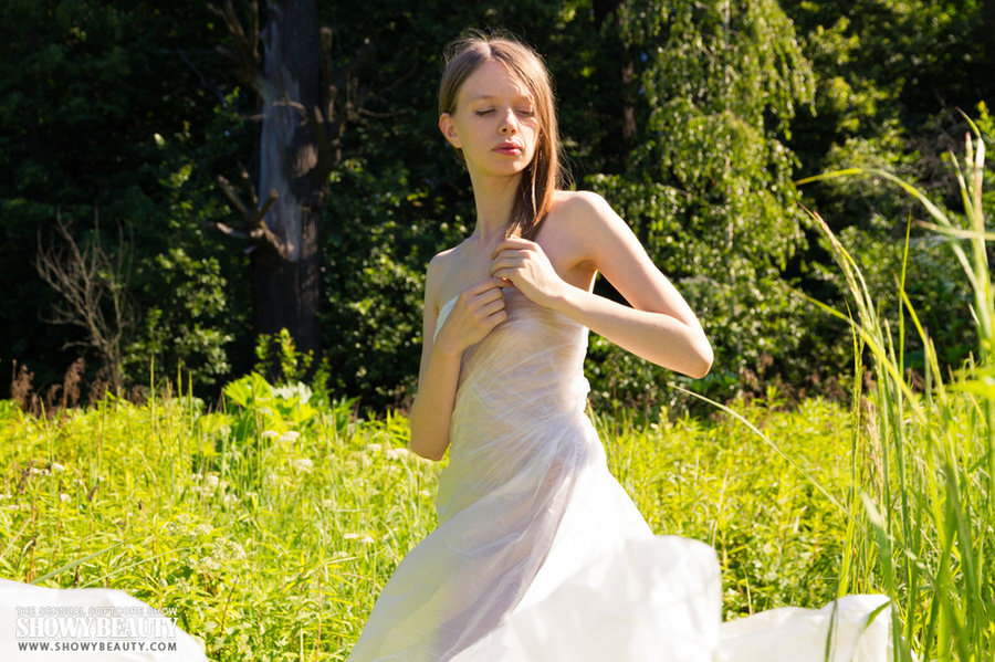 Alluring redhead pose naked and seduces with her skinny body with juicy tits and luscious pussy in different poses in a grass field. - XXXonXXX - Pic 3