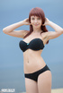 alluring redhead strips off