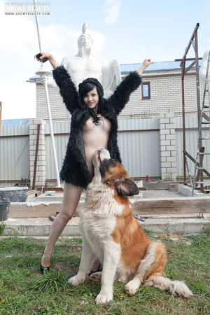 Gorgeous babe wearing black fur coat, blouse, gray and black panty and black high heels shows her luscious boobs while she displays her banging body before she gets naked and reveals her juicy twat in different poses outdoor with her st. bernard. - XXXonXXX - Pic 8