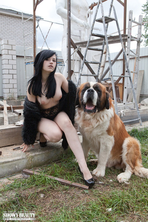 Gorgeous babe wearing black fur coat, blouse, gray and black panty and black high heels shows her luscious boobs while she displays her banging body before she gets naked and reveals her juicy twat in different poses outdoor with her st. bernard. - XXXonXXX - Pic 15