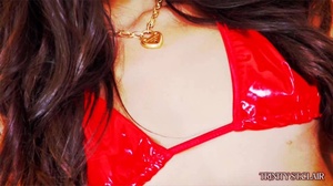 Brunette dressed in red masturbating on  - Picture 3