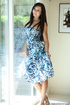 Long blue dress brunette takes it off on camera