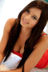 Tight jeans brunette dressed in red gets naked on cam