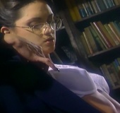 Sexy brunette in glasses and white lingerie lets busty blonde in black