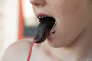 Flicking out her black tongue, she press - Picture 8