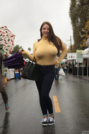 Short, with huge jugs, she struts around - Picture 11