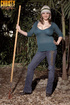 Sweater-wearing brunette goes deep into the woods to get off