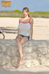 White top brunette goes to a beach to seduce men
