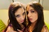 Exotic brunettes sucking a massive cock together in POV