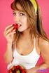 Brunette with big eyes and yellow panties and strawberry