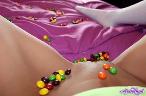 Skittles-loving young brunette in knee-l - Picture 13