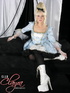 Fancy blonde whore wearing layers of sexy clothing and heels with black