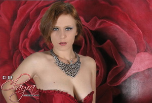 Sophisticated redhead wearing red and bl - Picture 3