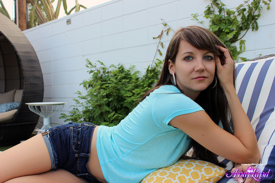 Naughty brunette with blue belly ring lifts - XXX Dessert - Picture 1