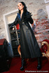 Red lipped stunner in leather outfit and high boots teasing her shaved