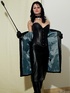 Collared chick in sexy leather outfit slowly stripteasing and exposing