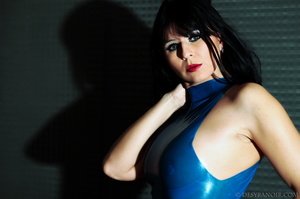 Blue latex brunette shows off her nipples and curves in her tight suit - Picture 7