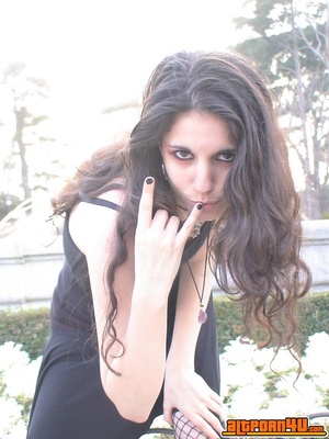 Goth chick poses in public in front of a fountain. - Picture 3