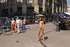 Naked brunette takes a walk and shocks some bystanders