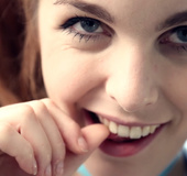 Hot redhead teen in blue lingerie eaten and fingered on the couch